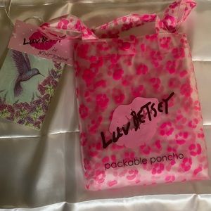 Betsey Johnson Luv Betsy packable poncho pink leopard